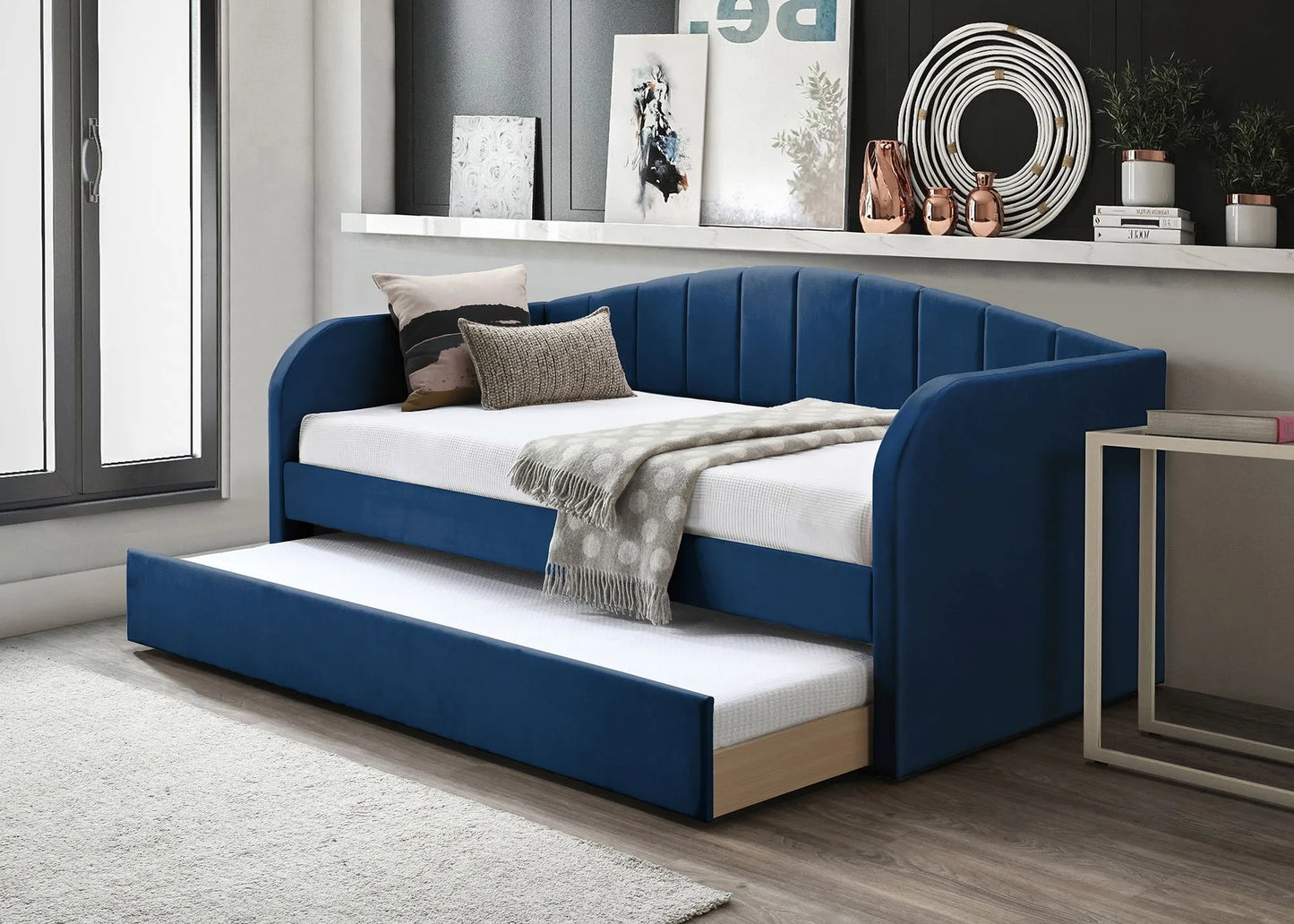 blue fabric day bed